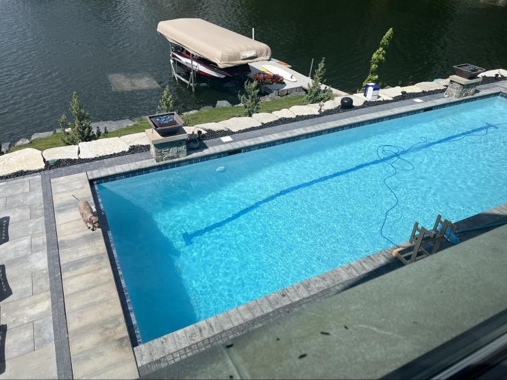 Swimming pool overlooking a pond